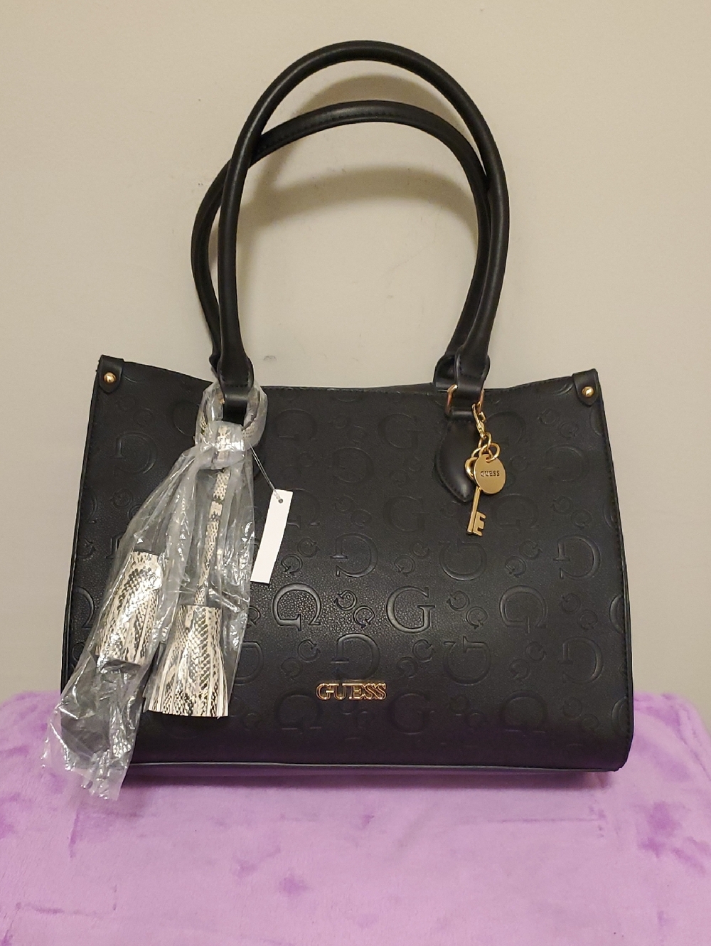 Guess Black Embossed Logo Tote with Gold Charm